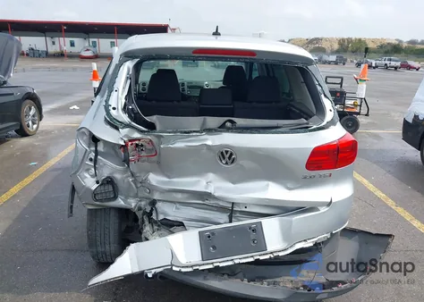 2014 Volkswagen Tiguan S from USA, damaged, VIN WVGAV3AX2EW579009